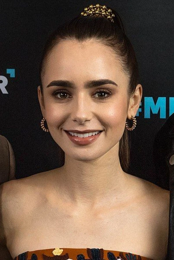 <strong>Lily Collins</strong>. Image by Neil Grabowsky.